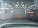 2008 Chevrolet Colorado - The dashboard of a vehicle displays various gauges including RPM and MPH, along with a digital readout indicating 'DOORS 9557'.