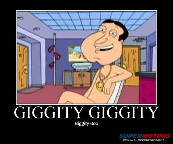Animated character with a gold chain sits in a chair in a room with doors and a TV