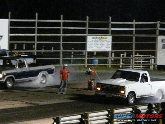 Picture of my 82 F100 and my cousins 78 F150 just getting the smoke rollin in the burnout box.