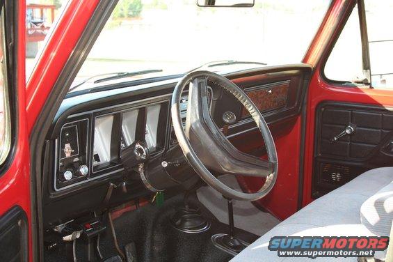 1979 Ford F-150 interior showing dashboard, steering wheel, and door panel