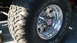 1979 Ford F-250 - This image shows a close-up of the wheel and tire assembly on a 1979 Ford F-250, highlighting the BFGoodrich Radial T/A tires and chrome wh…