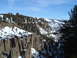 2006 Ford E350 - A vast canyon landscape covered in snow under a bright blue sky.