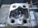 1987 Suzuki Samurai - Close-up view of a damaged transfer case housing, showing significant internal wear and debris.