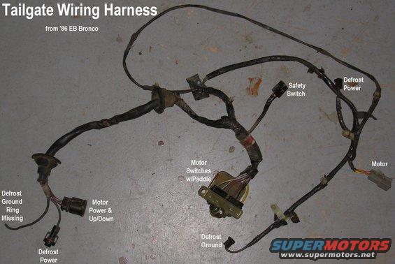 tgharness86.jpg SOLD Tailgate Harness fits '78~86 with or w/o defrost.

[url=http://www.supermotors.net/registry/media/930203][img]http://www.supermotors.net/getfile/930203/thumbnail/tgwiring.jpg[/img][/url]

To add a simple self-diagnostic capability, wire a 12V lamp across the latch safety switch terminals, and mount it in the tailgate shell above the lock cylinder in the inside sill (through a carpet retainer hole if present).  If either control switch is activated, and the only thing preventing the glass from moving is the safety switch, the lamp will light and be visible to a person using either switch.