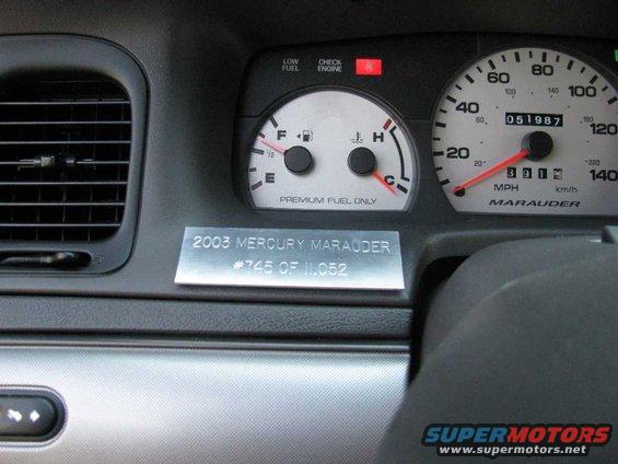 Dashboard gauges and air vent in a 2003 Mercury Marauder, with a plaque reading "2003 MERCURY MARAUDER #745 OF 11,052"