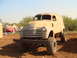 1992 Ford Bronco - This lifted panel truck appears to be a mid-20th century Chevrolet, not a 1992 Ford Bronco.