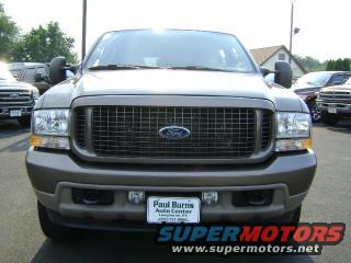 Front view of a 2003 Ford Excursion with a large grille and Ford logo