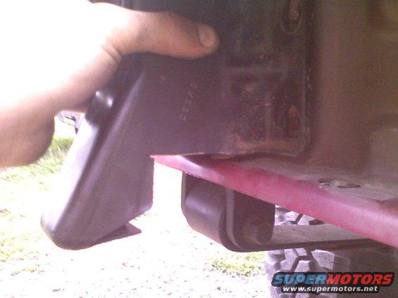 Custom rear hitch bumper on red vehicle