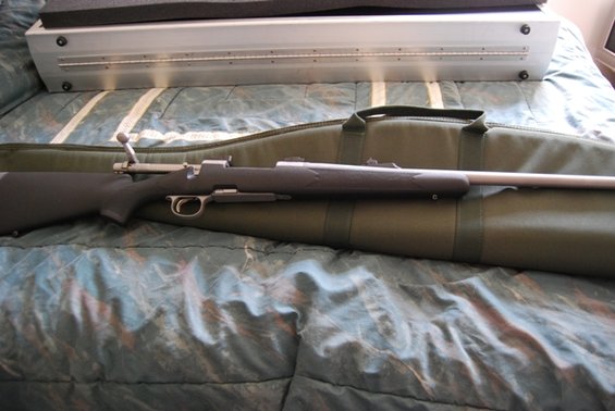 Rifle on a green gun bag