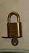 1979 Ford Bronco - Ford branded padlock with its key. The logo is embossed on the body.