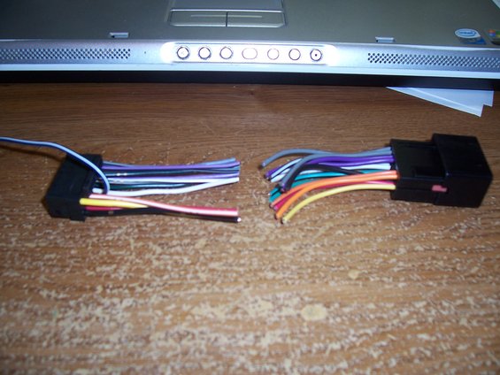 Two wiring harness adapters with multiple colored wires