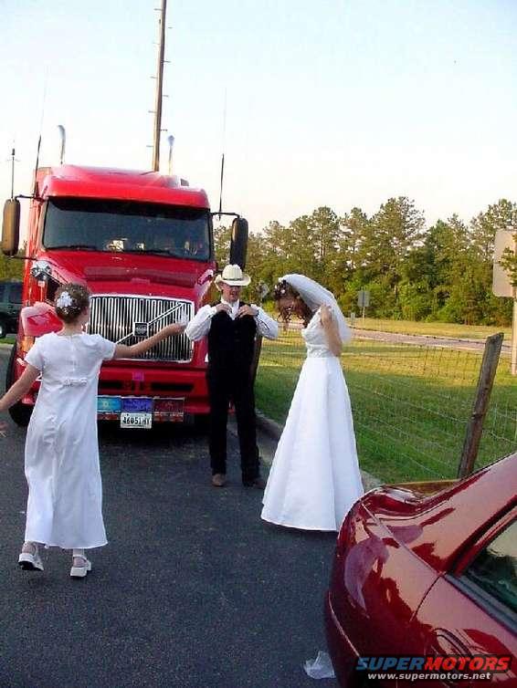 after_the_birdseed.jpg Wedding day June/9/2001(the rig was our limo)
