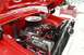 1979 Ford F-250 - The engine bay of a red 1979 Ford F-250 shows a V8 engine with a chrome air cleaner and a Turbo Start battery.