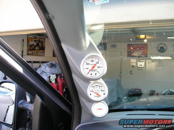 Truck interior with boost and transmission temperature gauges mounted on the A-pillar