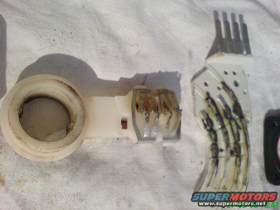 Damaged electrical connector with burnt wires