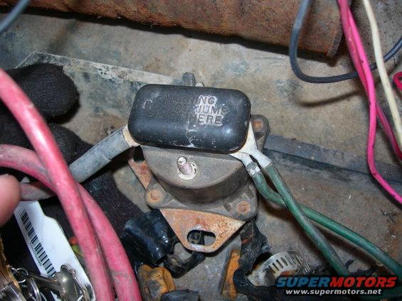 Ignition coil with text 'WARNING DO NOT JUMP START HERE'
