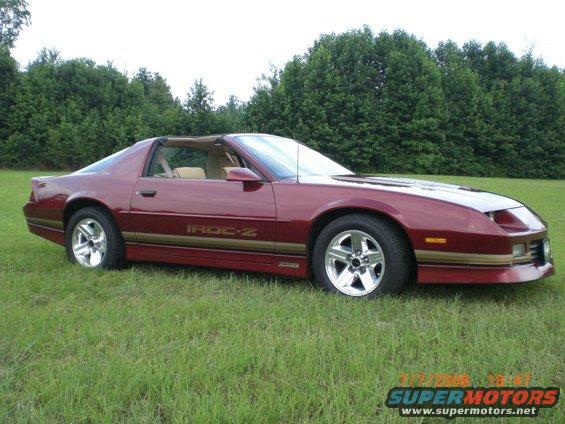 Red 1979 Chevrolet Camaro IROC-Z parked on grass
