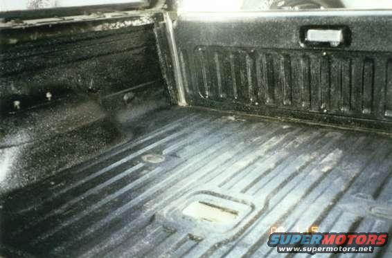 herculiner6.jpg My footprints in the back on the new liner.  (Date is  wrong.)