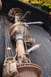 1996 Ford Bronco - Rear axle assembly with shocks and brake calipers, likely removed from a vehicle.