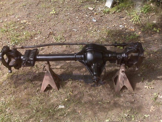 Dana 60 axle assembly on jack stands, with tie rod assembly attached