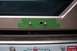 1996 Ford Bronco - Drilled holes for license plate light mounting, covered with green tape.