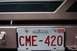 1996 Ford Bronco - The rear of a vehicle shows a New Brunswick license plate with the number CME-420 and an expiration sticker from July 2009.