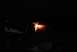 1996 Ford Bronco - A close-up view of a welding torch emitting bright sparks and orange flame against a dark background.