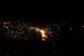 1996 Ford Bronco - A sparkler creates a burst of light and sparks in the dark.