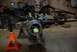 1996 Ford Bronco - The vehicle is on jack stands, showing the front axle hub assembly removed for maintenance.
