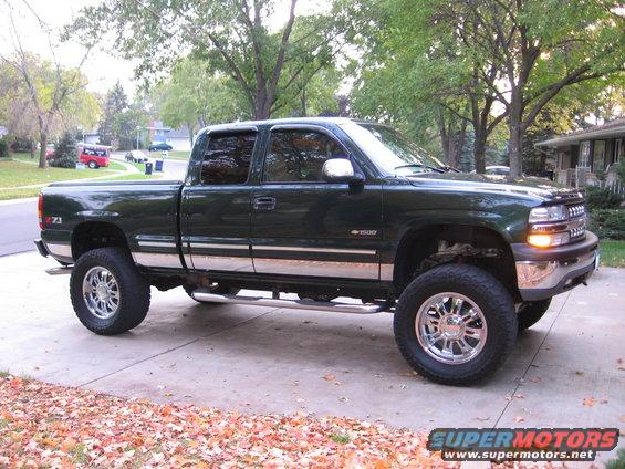 took the chrome handles & trim off, also put on nerf bars!!!