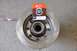 1996 Ford Bronco - Close-up of a brake rotor and a National wheel bearing kit box.