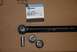 1996 Ford Bronco - NAPA Chassis part 274-9386 and associated hardware laid out on a cardboard surface.