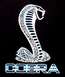 2001 Ford Mustang - Cobra snake emblem and text graphic, likely a decal or badge.