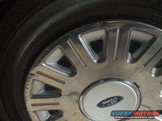 Close-up of a Ford wheel with an oval logo