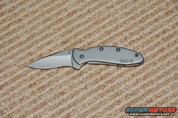 Kershaw folding knife on carpet