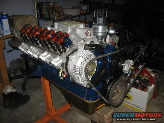 img_1609.jpg 3G alternator on stock '65 high-mount brackets. The alt was shimmed slightly for clearance between the rear of the alt and the front of the cyl head