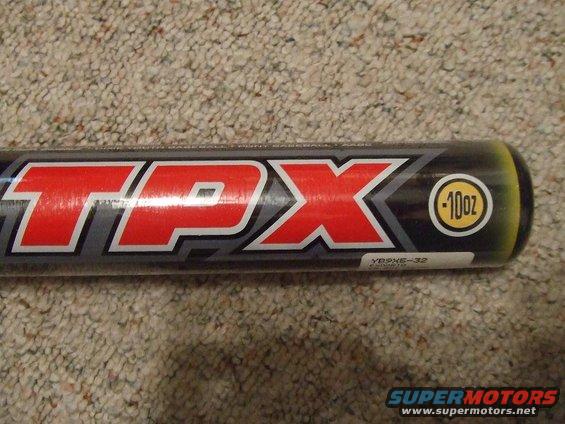 Baseball bat with red TPX logo and 10oz label