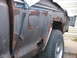 1978 Ford F-250 - The body of this truck is severely corroded, with large holes in the rear quarter panel.