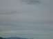 2008 Honda RANCHER - Mountains are visible under a cloudy sky.