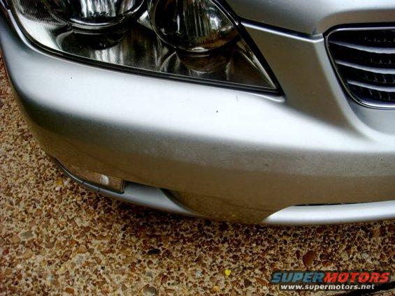 dsc03235.jpg Notice the oxidation and fading on the front bumper and the fogginess of the headlights.