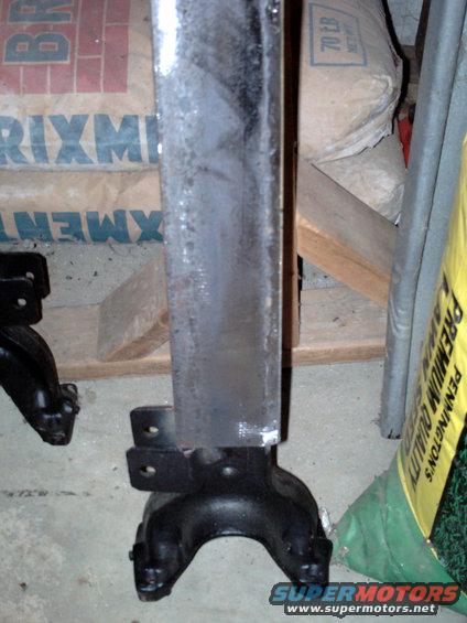 Close-up of a vehicle frame part with mounting brackets