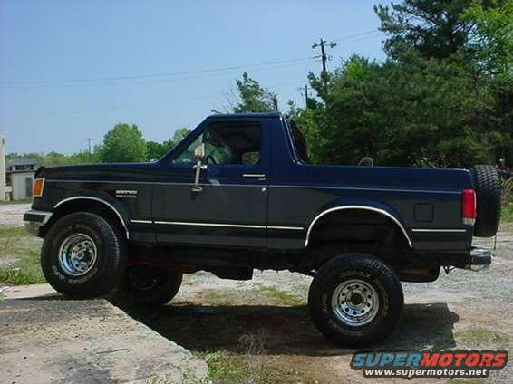 Dark blue 1989 Ford Bronco, side view
