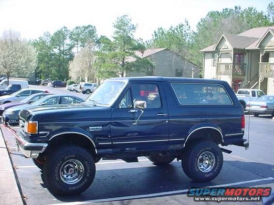Dark blue 1987 Ford Bronco side view