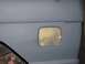 1976 Ford Bronco - This vehicle body panel is prepped for paint, with the fuel door area visible.