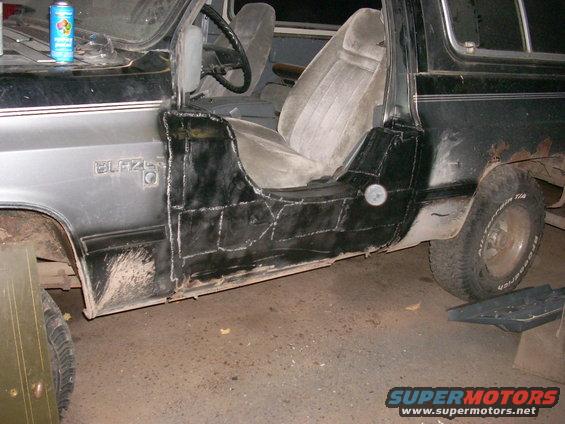 1988 Chevrolet Blazer side view showing custom metalwork on the driver's door and interior