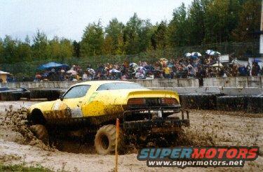 Lumpys firebird, on a 1 ton frame and axles. 350 tweaked on and back hoe front tires. Weeks prior, it was a drag race car, and street driven.