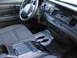 2001 Ford Crown Victoria - The interior of the vehicle shows the dashboard, steering wheel, and center console area.