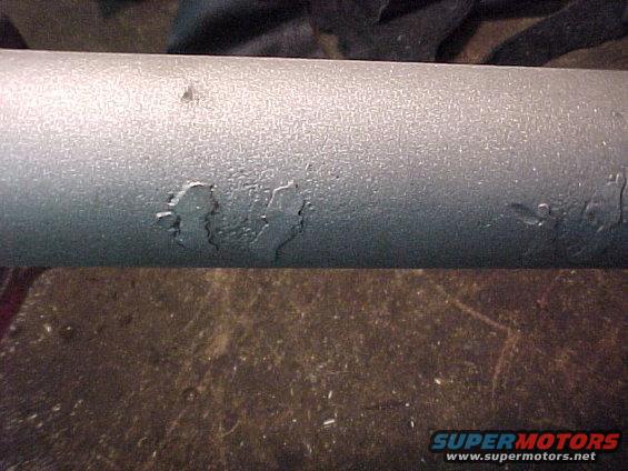Damage to the rear axle from being used as part of a home made trailer. These old welds were ground smooth and don't show any more.