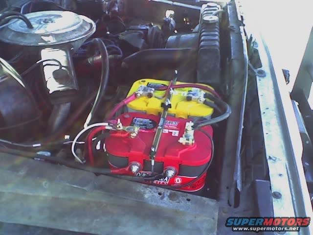 010606_1319.jpg Dual battery setup with compressor in background.