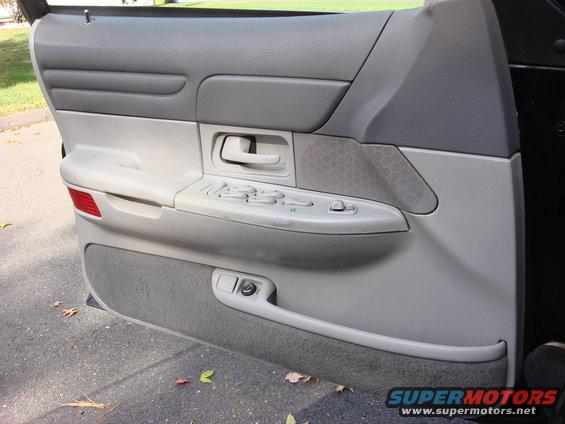 2003 Ford Crown Victoria interior door panel with power window controls
